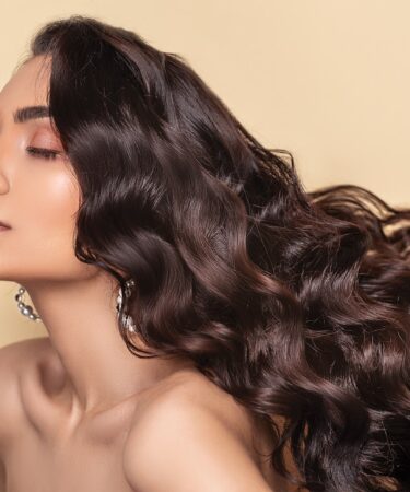 topless woman with eyes closed